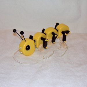 Caterpillar String Toy, Sun Yellow and Kona Brown.